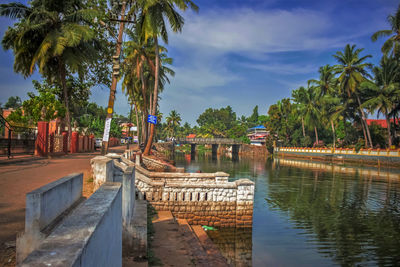 Panoramic view of swimming pool in city against sky