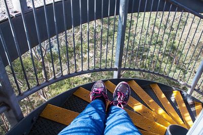 Low section of woman on steps