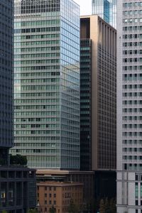 Low angle view of modern buildings in city