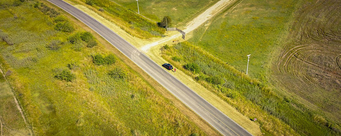 High angle view of road amidst land