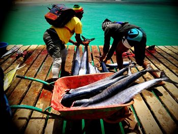 Men fishing on boat