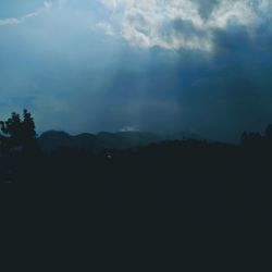 Scenic view of silhouette landscape against sky