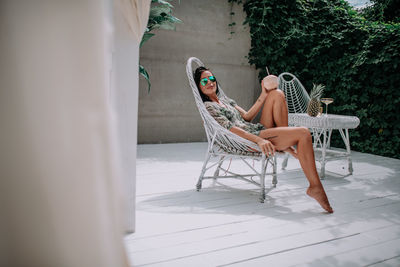 Woman sitting on chair