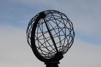 Low angle view of metal structure against sky