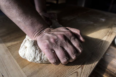 Close-up of person preparing food