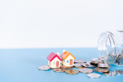 Close-up of objects over sea against blue background