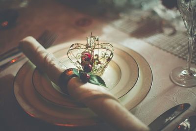 Close-up of antique decoration on table