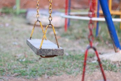 Close-up of swing in park