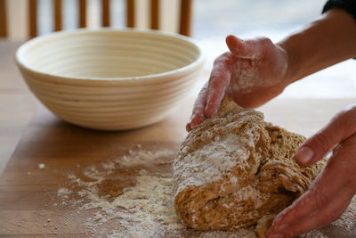 Midsection of person preparing food