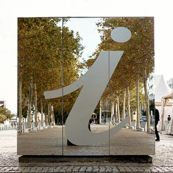 Gazebo in park against buildings in city