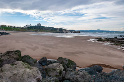 Scenic view of beach against sky