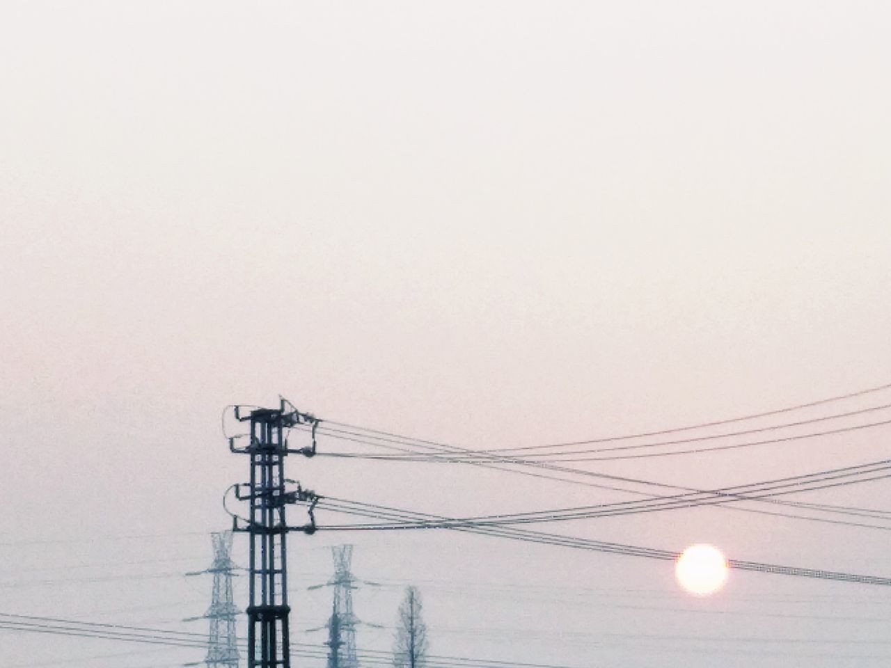 cable, connection, electricity, copy space, power line, electricity pylon, power supply, fuel and power generation, no people, technology, outdoors, low angle view, day, clear sky, nature, sky