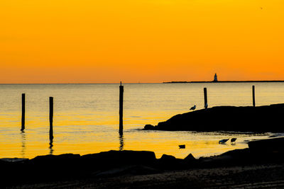 Scenic view of sunset over sea