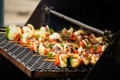 Close-up of meat on barbecue grill