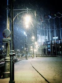 Illuminated street light at night