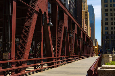 Bridge against buildings in city