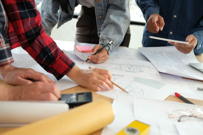 Group of people working on table