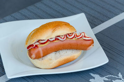 Hot dog served on plate