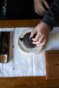 Midsection of person preparing food