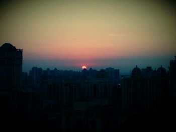 View of cityscape at sunset