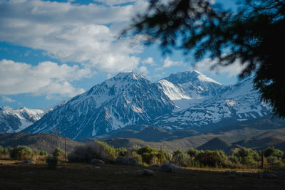 Scenic view of snowcapped mountains against sky