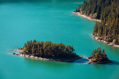 High angle view of bay against clear blue sky