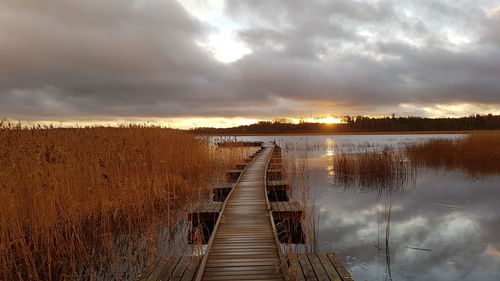 Panoramic view of lake against sky during sunset