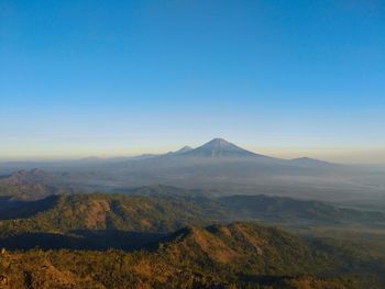 Scenic view of mountains against clear sky