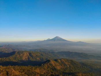 Scenic view of mountains against clear sky