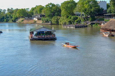 Boats sailing in river