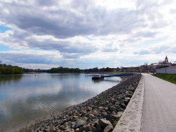 View of lake against cloudy sky
