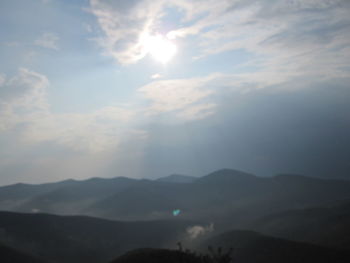 Scenic view of mountains against sky during sunset