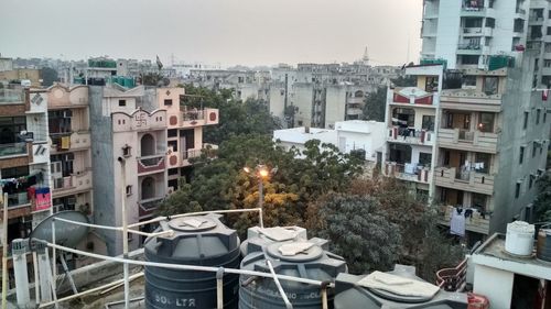 View of buildings in city against sky