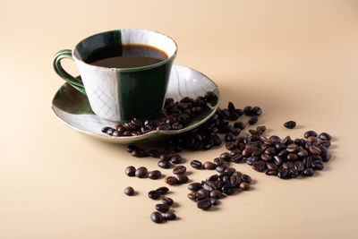 Close-up of coffee cup on table