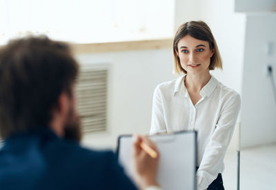 Woman sitting at job interview