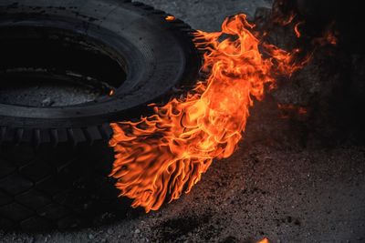 High angle view of burning fire on field