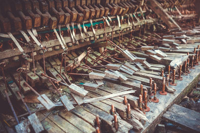 Stack of rusty metal in row