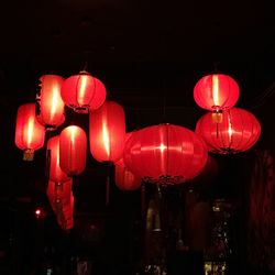 Illuminated lanterns hanging at night