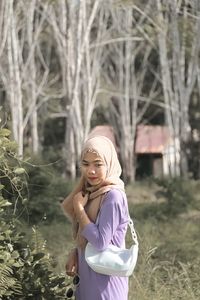 Woman standing on field