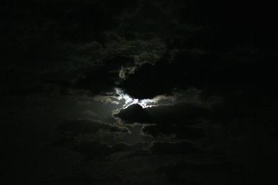 Low angle view of moon in sky at night