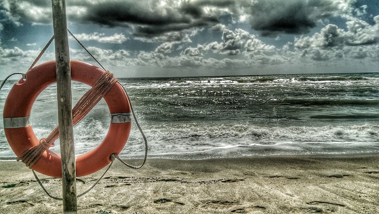 sea, sky, horizon over water, water, cloud - sky, beach, shore, cloudy, tranquility, scenics, cloud, tranquil scene, beauty in nature, sand, nature, idyllic, wave, nautical vessel, outdoors, boat