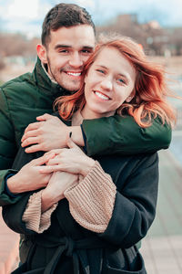 Portrait of a smiling young couple