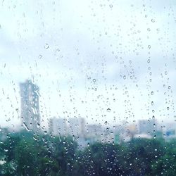 Full frame shot of raindrops on window