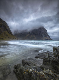 Scenic view of sea against cloudy sky