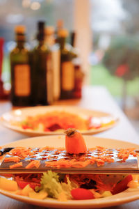 Close-up of carrot plate on table