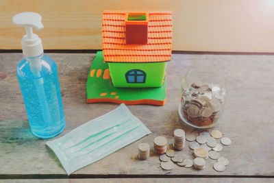 High angle view of coins on table
