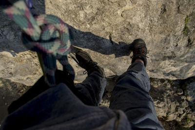 Low section of man on rock