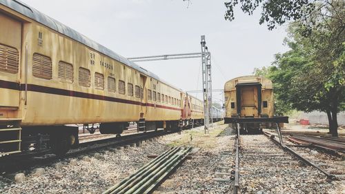 Train on railroad track against sky