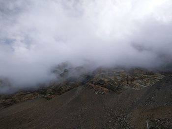 Scenic view of mountains in foggy weather