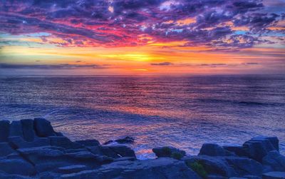 Scenic view of sea during sunset